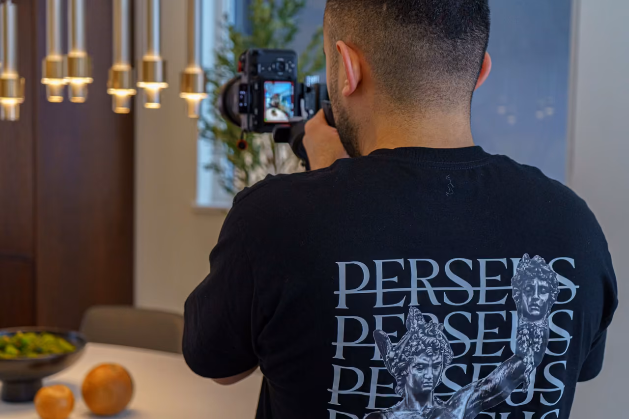 Photographer and videographer working together on a Vancouver real estate listing shoot