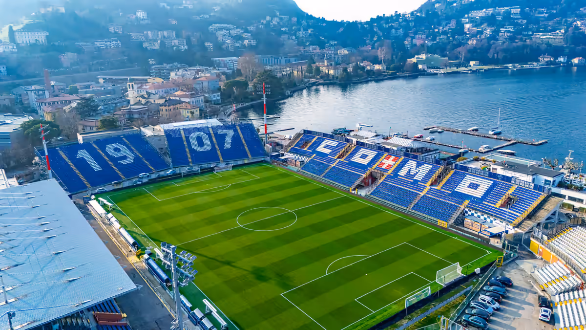 Aerial view of the Como 1907 football stadium beside Lake Como during a Match Tour 11 trip.