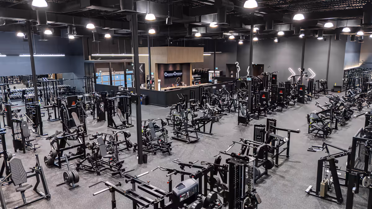 Expansive strength-training floor at Obsidian Athletic Club’s Edmonton location, captured for a facility tour by Perseus Creative Studio.