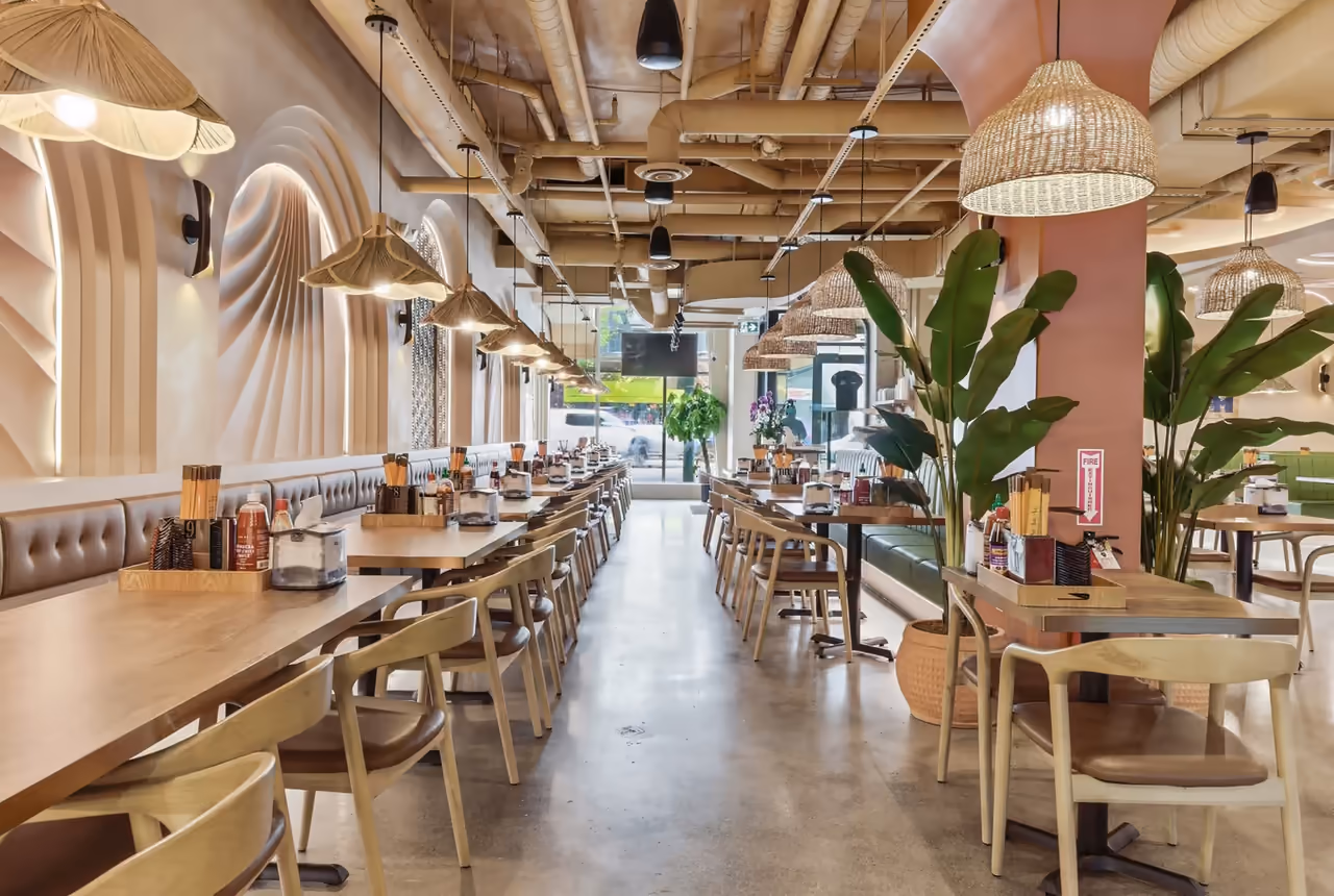 Sunlit dining room of Pho Anh Vu restaurant in Richmond, BC photographed after its interior build-out.